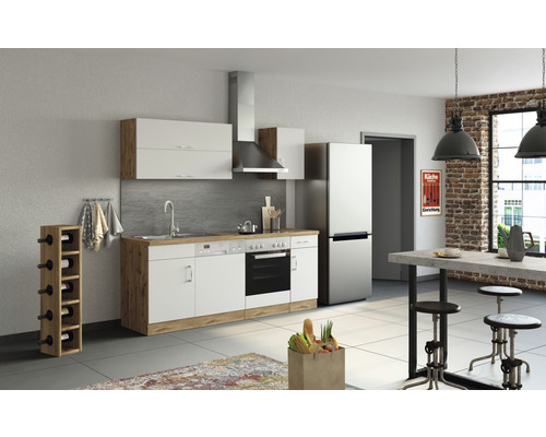 Cuisine moderne avec kitchenette, hotte aspirante, réfrigérateur, casier à bouteilles et table à manger