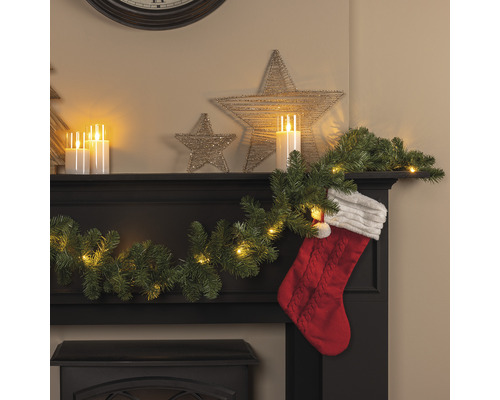 Cheminée décorative avec guirlande lumineuse à LED, guirlande de sapin, étoiles et chaussette de Noël pour une ambiance festive