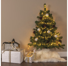 Sapin de Noël décoré avec cadeaux