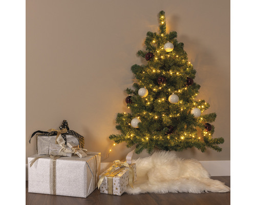 Sapin de Noël décoré avec cadeaux