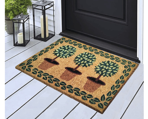 Paillasson avec motif de pot d''arbre devant une porte d''entrée