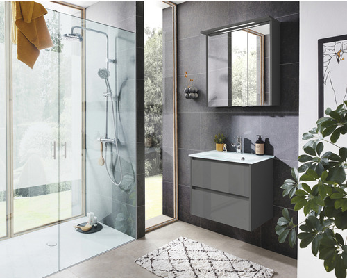 Salle de bains moderne avec douche et meuble-lavabo avec miroir