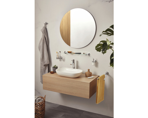 Salle de bains avec meuble sous-vasque, vasque à poser et miroir rond