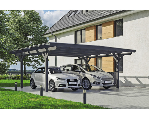 Carport aus Holz mit zwei Autos vor einem Haus