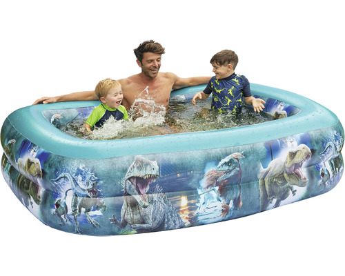 Pataugeoire gonflable avec motifs de dinosaures et personnes jouant