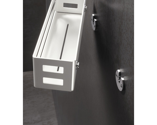 Weißes Duschregal zur Wandmontage mit Aussparungen.