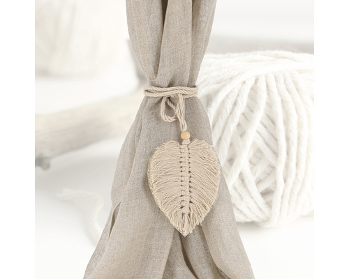 Rideau avec embrasse décorative en forme de feuille