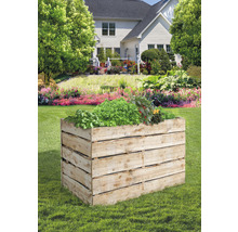 Jardinière surélevée en bois avec plantation dans le jardin
