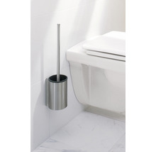 Ensemble de brosse de toilette murale en acier inoxydable à côté de toilettes