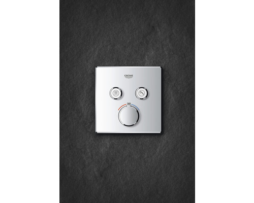 Grohe Logo. Duschthermostat mit Wannenfüllfunktion und Temperaturregler.