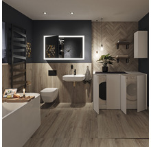 Salle de bain moderne avec baignoire, lavabo, toilette et lave-linge