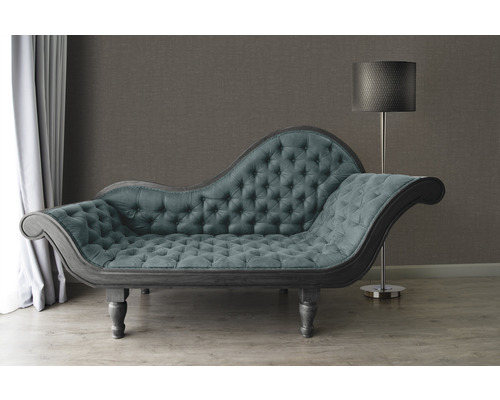 Chaiselongue mit Knopfheftung und Stehlampe