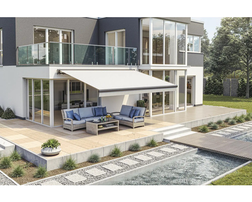 Maison avec store, terrasse et mobilier de jardin