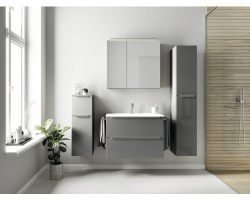 Salle de bains moderne avec meuble sous-lavabo, armoire de toilette et armoire haute au design brillant