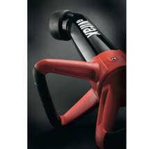 Detailansicht einer eVIRAK Unkrautbürste mit rotem Griff und schwarzem Bürstenkopf.