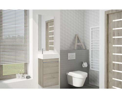 Salle de bain moderne avec lavabo, miroir, WC et radiateur