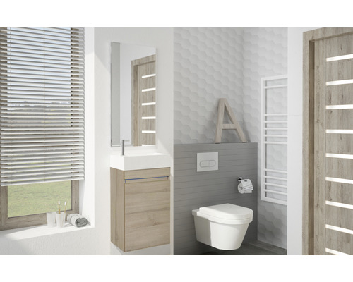 Salle de bain moderne avec lavabo, armoire de toilette, WC et radiateur