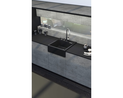 Évier de cuisine avec robinet dans une cuisine au design moderne.