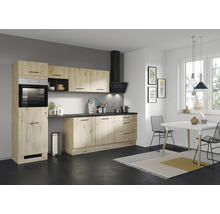 Cuisine claire avec des accents de bois, hotte aspirante et table à manger
