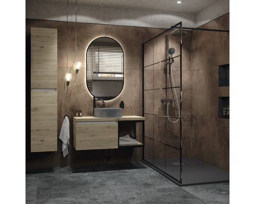 Badezimmer mit Waschtisch, Spiegelschrank, beleuchtetem Spiegel und Duschkabine.