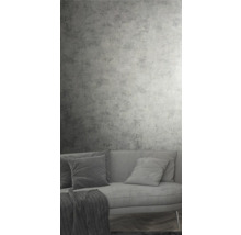 Wohnzimmer mit Betonwand und Sofa