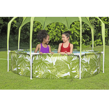 Rundes Frame-Pool-Set mit Sonnenschutz und Dschungelmotiven, mit zwei Mädchen im Pool