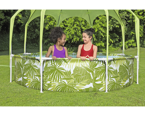 Rundes Frame-Pool-Set mit Sonnenschutz und Dschungelmotiven, mit zwei Mädchen im Pool
