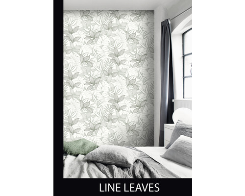 Schlafzimmer mit Tapete mit Blätterdessin