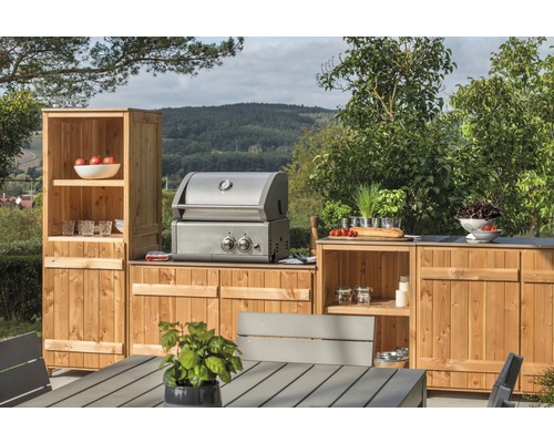 Outdoor-Küche mit Grill, Schränken und Tisch für den Gartenbereich