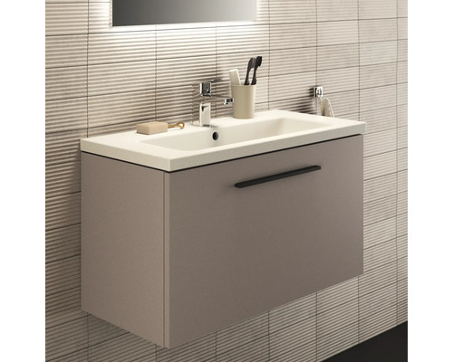 Waschtischunterschrank mit Aufsatzwaschbecken in hellem Badezimmer