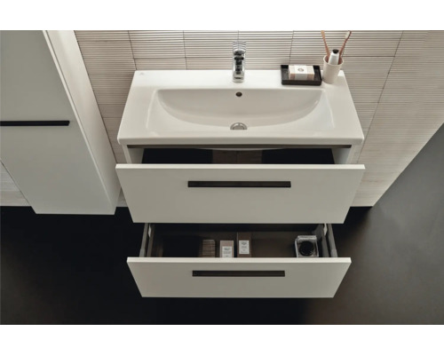 Meuble sous-lavabo avec lavabo et deux tiroirs ouverts dans la salle de bain