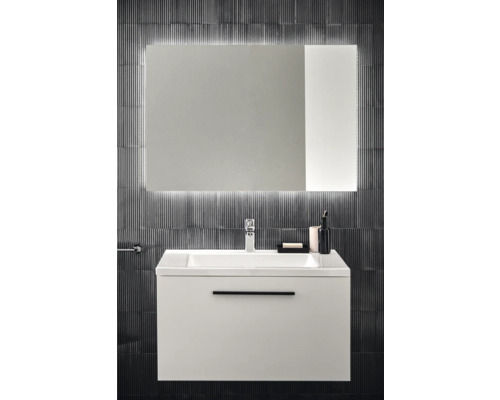 Badezimmerwaschtisch mit Unterschrank und beleuchtetem Spiegel