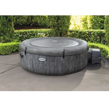Jacuzzi gonflable Intex avec couverture dans le jardin