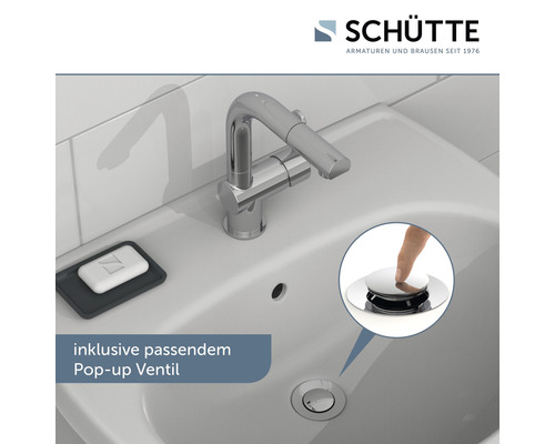 Waschbecken mit Armatur und Pop-up-Ventil.