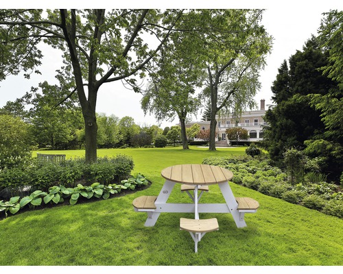 Runder Picknicktisch aus Holz und Metall im Garten