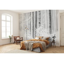 Schlafzimmer mit Fototapete Winterwald, Bett und Holzboden