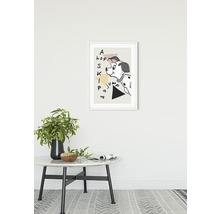 Affiche encadrée avec motif dalmatien au-dessus d''une table ronde avec décoration