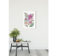 Affiche encadrée avec motif floral sur le mur