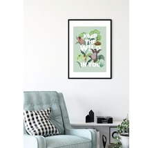 Affiche encadrée du Livre de la jungle avec l''inscription Keep the Wild in You au-dessus d''un fauteuil