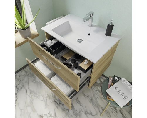Waschtischunterschrank mit offenem Schubladensystem und Keramikwaschbecken im Badezimmer