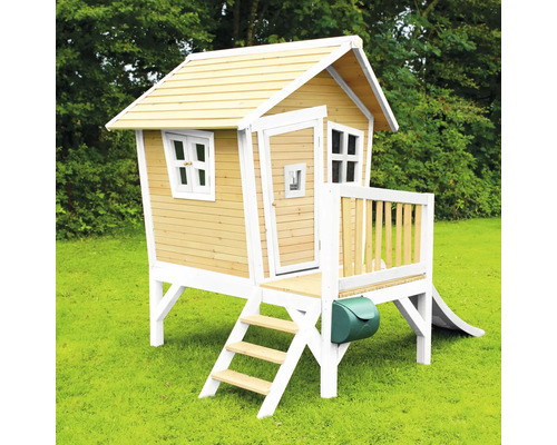 Cabane de jeux en bois avec escalier, toboggan et boîte aux lettres dans le jardin