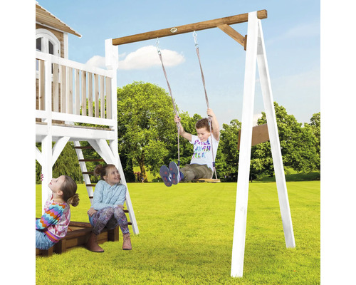 Balançoire pour enfants avec des enfants jouant dans le jardin.