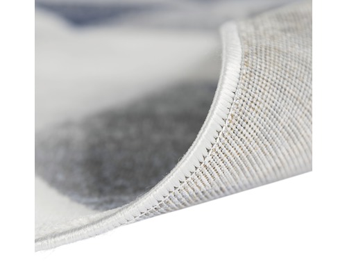 Vue détaillée d''un tapis, montrant la texture et la finition