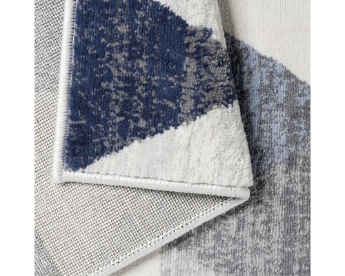 Vue détaillée d''un tapis à motif géométrique