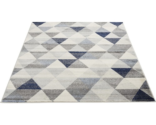 Tapis avec motif géométrique triangulaire