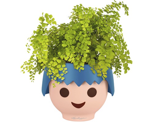 Pot de fleurs en forme de tête d''enfant stylisée avec plante