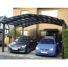 Doppelcarport aus Metall mit zwei geparkten Autos