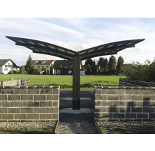 Pergola de terrasse autoportante en métal et en verre avec mur en pierre