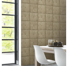 Modernes Interieur mit Wandpaneelen in Betonoptik neben Fenster, Tisch und Stühlen