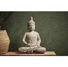 Buddha Statue aus Stein auf einem Tisch